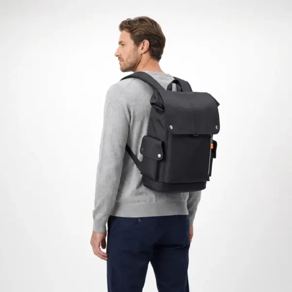 Black flap laptop backpack on a 185 cm man, full length